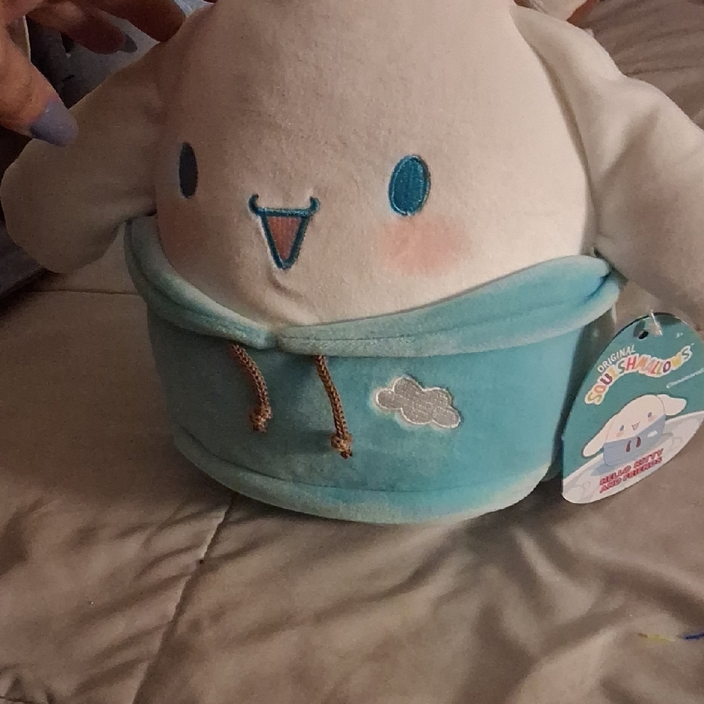 Squishmallows Cinnamoroll Plush in Light Blue Hoodie with Gold Drawstrings